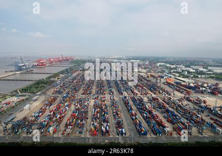 SHANGHAI, CHINA - JUNE 6, 2023 - Aerial photo taken on June 6, 2023 shows container handling operations at Waigaoqiao Port area of Shanghai Port in Sh Stock Photo