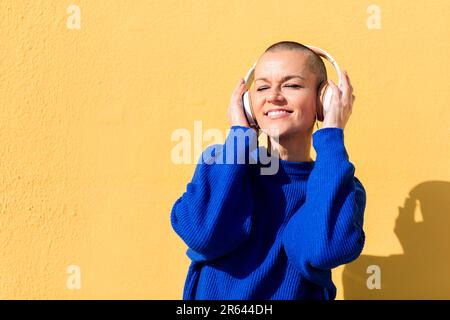 woman enjoying happy the music in her headphones Stock Photo