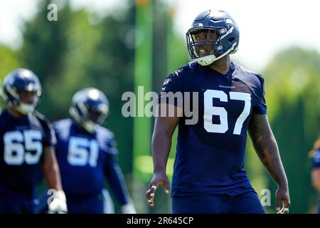 Seattle Seahawks offensive tackle Charles Cross (67) prepared to block  against the Dallas Cowboys during the first half of a preseason NFL  football game in Arlington, Texas, Friday, Aug. 26, 2022. (AP