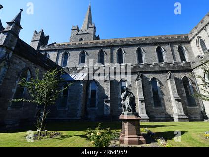 Bronze statue of Sir Benjamin Lee Guinness by John Henry Foley, erected in 1875 outside the St Patrick's Cathedral in Dublin, Ireland. Stock Photo