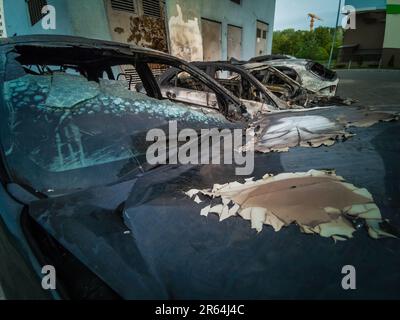 Burnt new car. burnt metal texture, metallic background. Stock Photo