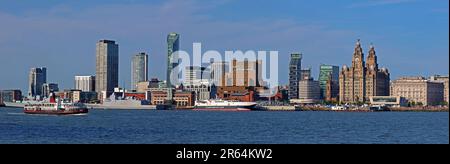 Royal Iris Mersey Ferry approaches Liverpool waterfront panorama from Woodside, Birkenhead, Wirral, Merseyside, England, UK, CH41 6DU Stock Photo
