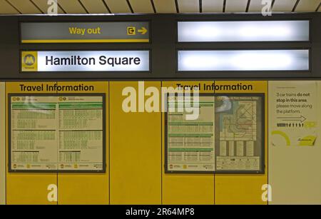Platform signage and travel information boards at Hamilton Square station Birkenhead on the Merseyrail underground network, Wirral, England Stock Photo