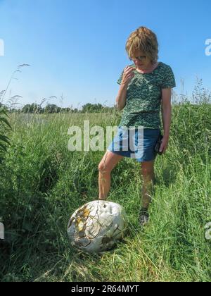 Netherlands - Giant puffball or Calvatia gigantea is a puffball mushroom found in meadows, fields and deciduous forests in late summer. Stock Photo