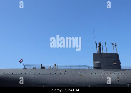 upper part of former royal navy submarine 'Tonijn' in Marine Museum in dutch city Den Helder under clear blue sky, the Netherlands Stock Photo
