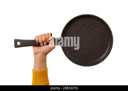 granite pan for pancakes in hand isolated on white background Stock Photo