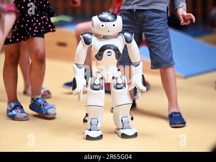 Karlsruhe, Germany. 07th June, 2023. The humanoid robot 'NAO' is introduced in the inclusive daycare center at the Lebenshilfehaus Karlsruhe. There, it accompanies the children in their everyday life. The project is part of the Real Lab Robotic AI of the Karlsruhe Institute of Technology (KIT), which makes artificial intelligence (AI) and robotics tangible for all people. Credit: Uli Deck/dpa/Alamy Live News Stock Photo