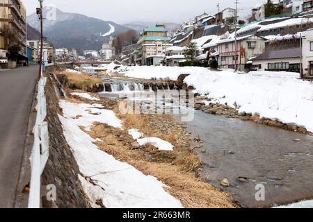 Yokoyugawa river flowing through Shibu Onsen Stock Photo