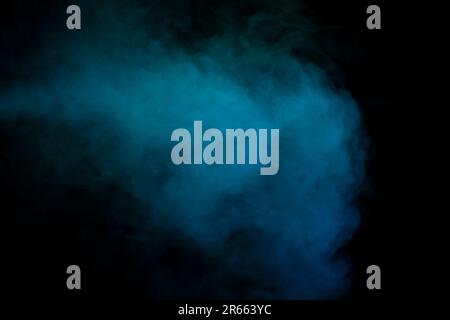 Blue and green steam on a black background. Copy space. Stock Photo