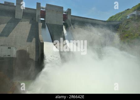 Gassan Dam and water discharge Stock Photo - Alamy