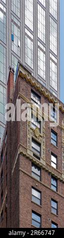 Emery Roth-designed 435 East 57th Street features rich cream-colored terra cotta ornamentation of its red brick façade. Stock Photo