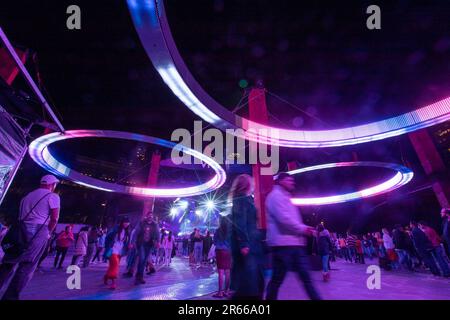 Sydney, Australia. 7th June, 2023. People enjoy light installations during the Vivid Sydney light festival in Sydney, Australia, June 7, 2023. As one of Sydney's most iconic events, Vivid Sydney is held from May 26 to June 17 this year, celebrating the soul of Sydney with illuminations, installations and interactive events. Credit: Hu Jingchen/Xinhua/Alamy Live News Stock Photo