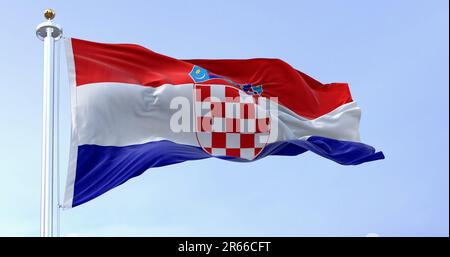 The national flag of Croatia waving in the wind on a clear day. Red, white and blue horizontal stripes with coat of arms in center. 3d illustration re Stock Photo