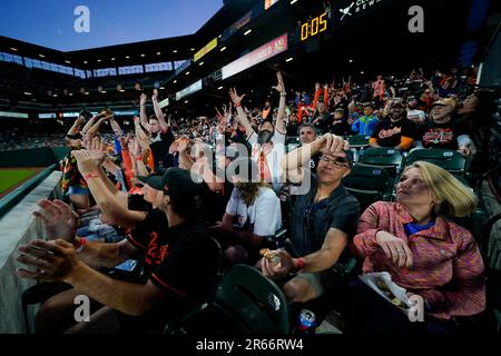 Mr. Splash sprays fans in the Bird Bath Splash Zone during the seventh  inning of a baseball game between the Baltimore Orioles and the Texas  Rangers, Friday, May 26, 2023, in Baltimore.