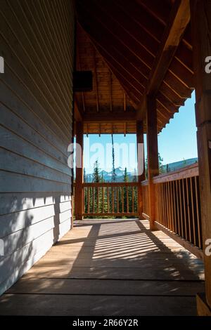 Outdoor deck and porch, looking out to mountains. Taken in Yoho National Park Canada Stock Photo