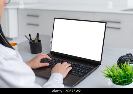 Laptop computer mockup. Woman work on laptop in office. Business composition. Isolated screen for web page presentation Stock Photo