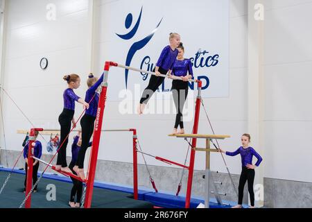 Gymnasts warm up at the Opening of the new Gymnastics Arena in Möckelö on Åland, 3 March 2023. Photograph: Rob Watkins Stock Photo