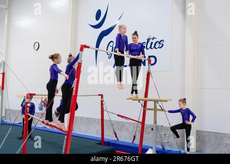 Gymnasts warm up at the Opening of the new Gymnastics Arena in Möckelö on Åland, 3 March 2023. Photograph: Rob Watkins Stock Photo