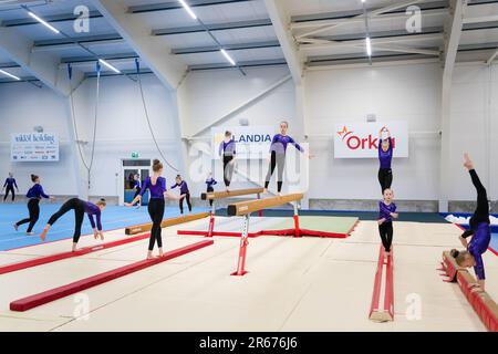 Gymnasts warm up at the Opening of the new Gymnastics Arena in Möckelö on Åland, 3 March 2023. Photograph: Rob Watkins Stock Photo