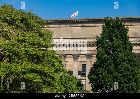 St George Cross English Nation Country Flag flying over St George's Hall in Liverpool Stock Photo