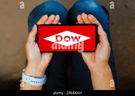 In this photo illustration, the Dow Chemical Company logo is displayed on a smartphone screen. Stock Photo