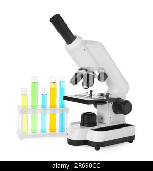 Test tubes with colorful liquids and microscope in blue light Stock ...