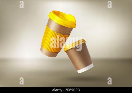 Takeaway paper cups falling on beige background Stock Photo