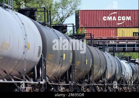 Wayne, Illinois, USA. Canadian National Railway freight trains meet on separate tracks and operating subdivisions. Stock Photo