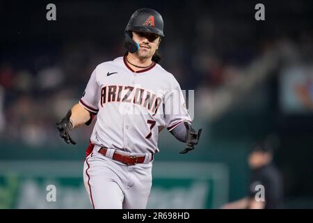 Arizona Diamondbacks' Corbin Carroll checks his swing on a high pitch  during the first inning of the team's baseball game against the Cincinnati  Reds on Saturday, Aug. 26, 2023, in Phoenix. (AP