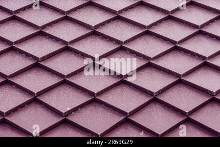 Triangular shaped of red roof tile pattern background, Roof tile seamless pattern for house. Stock Photo