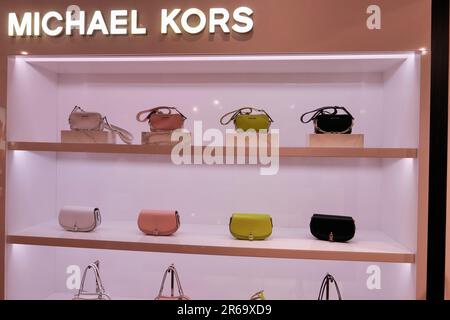 MICHAEL KORS BAGS ON DISPLAY INSIDE THE FASHION STORE Stock Photo