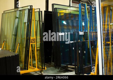 A manufacturing environment producing PVC windows in a factory Stock Photo