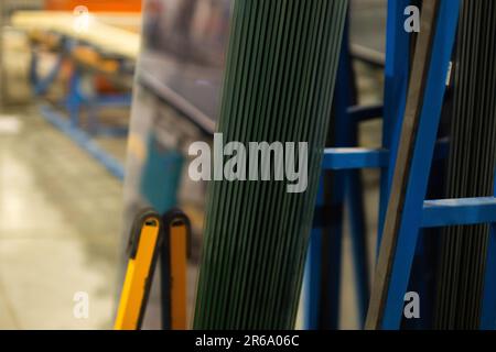 A manufacturing environment producing PVC windows in a factory Stock Photo