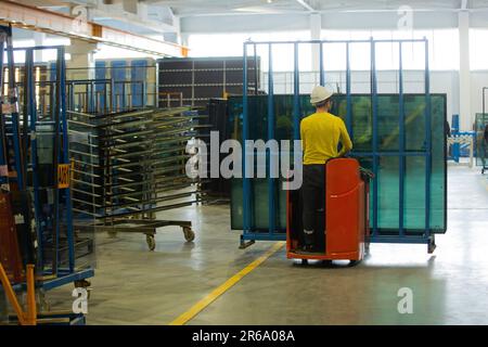 A manufacturing environment producing PVC windows in a factory Stock Photo