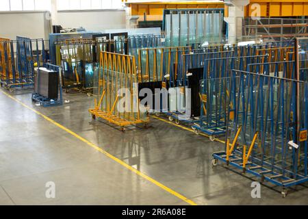 A manufacturing environment producing PVC windows in a factory Stock Photo