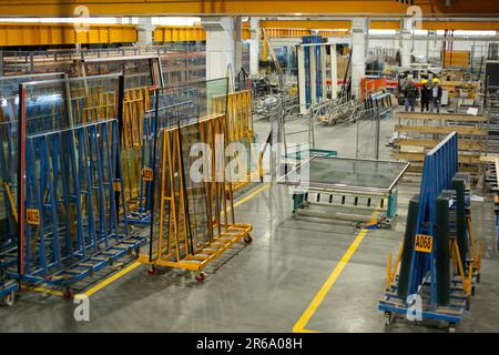 A manufacturing environment producing PVC windows in a factory Stock Photo