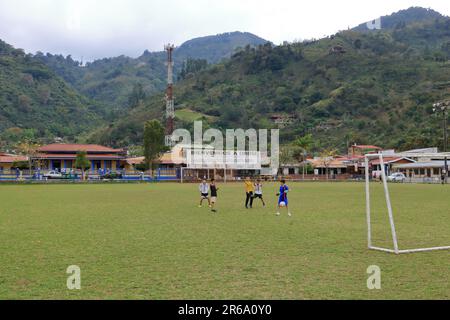 March 3 2023 - Orosi in Costa Rica: Football playing children in the center of the village Stock Photo