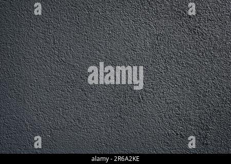 black or dark gray wall roughcast plaster background texture pattern Stock Photo