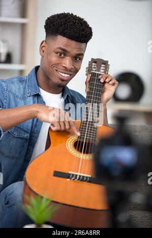 handsome man recording song - vlogging concept Stock Photo