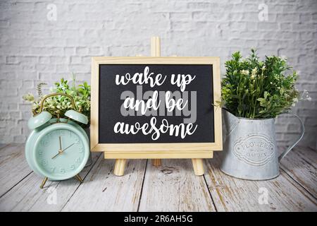 Wake up and be Awesome text message motivational and inspiration quote Stock Photo