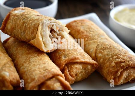 Egg rolls on a white plate Stock Photo