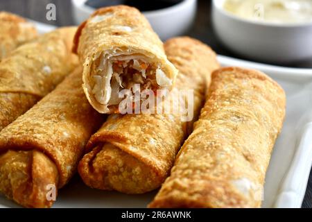Egg rolls on a white plate Stock Photo