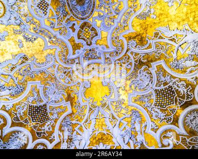 Rare Rococo white and gilt stucco decoration ceiling of the Queen's room  - Royal Palace of Naples that In 1734 became the royal residence of the Bourbons - Naples, Italy Stock Photo