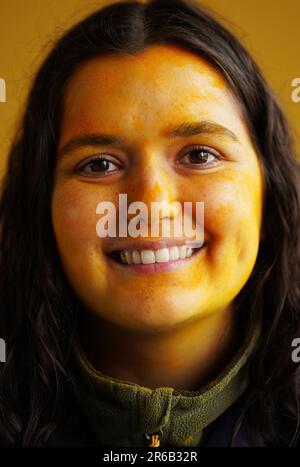 BA Media graduate Steph Saidha with her work 'Sabji and Sliced Pan' at the National College of Art and Design, Dublin, as it launched it's 2023 NCAD Works' graduate showcase. Steph using turmeric and materials from her family's farm along with her body explores themes of tradition, family, gender and bi-racial identity. Picture date: Thursday June 8, 2023. Stock Photo