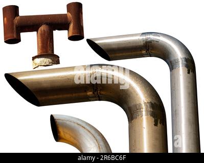Group of metal exhaust pipes, steel and rusty iron, isolated on white background. Stock Photo