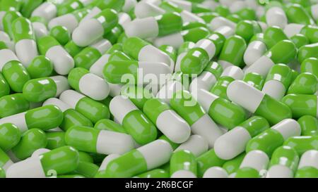 Bunch of green white capsule pills on a white background - Medicine healthcare medicaments Stock Photo