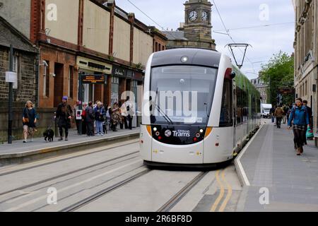 Edinburgh, Scotland, UK. 8th Jun 2023. The tram extension to Newhaven finally opens to the public this week. The 2.9 mile, eight stop route, which has been under construction since November 2019, has been delivered on schedule and within the £207.3m budget.  Passengers at the new station at the 'Foot of the Walk' on Constitution Street, Leith.  Credit: Craig Brown/Alamy Live News Stock Photo