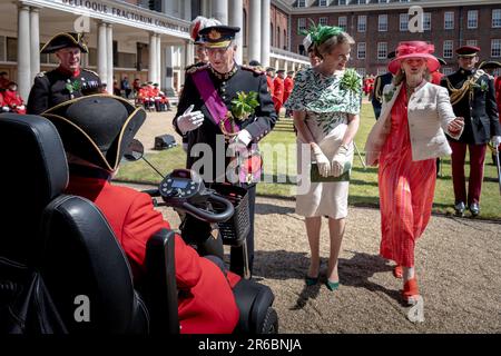 London, UK. 8th June 2023. Philippe and Queen Mathilde of Belgium meet and greet pensioners during Royal Hospital Chelsea Founder's Day, also known as Oak Apple Day. Held on a date close to 29th May – the birthday of Charles II and the date of his restoration as King in 1660. The Oak reference commemorates the escape of the future King Charles II after the Battle of Worcester (1651) when he hid in an oak tree to avoid capture by the Parliamentary forces. Chelsea Pensioners wear symbolic oak leaves on their famous scarlet uniforms. Credit: Guy Corbishley/Alamy Live News Stock Photo
