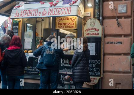 Italian street food vendor serves people in streets of genoa italy Stock Photo