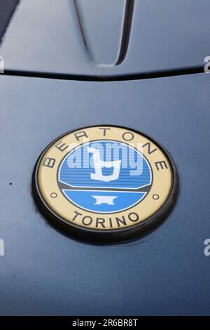 Bertone X1/9 highlighting a close up of the Bertone of Turin styling badge affixed to the front of the bodywork, May 2023. Stock Photo